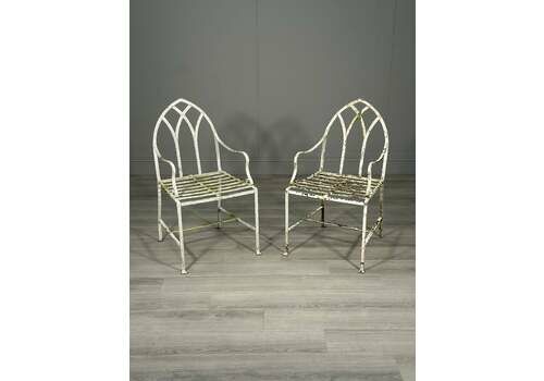 A Pair Of Antique Wrought Iron Garden Chairs
