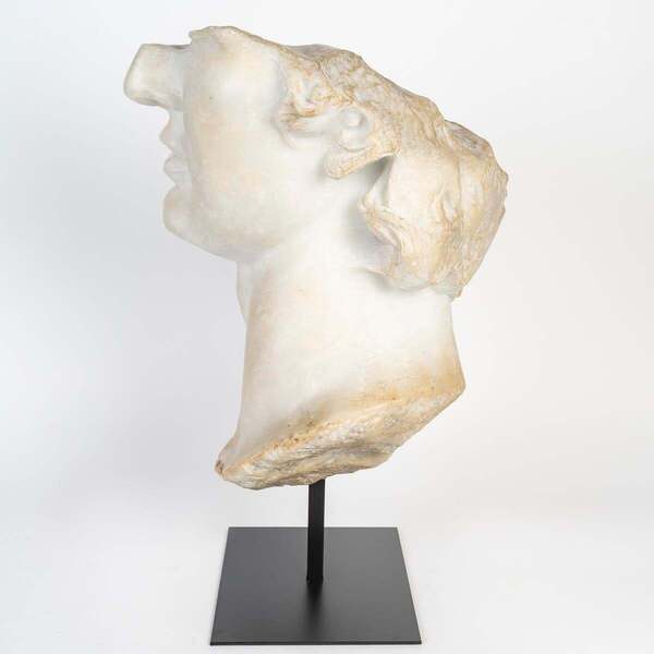 Sculpture Representing A Fragment Of The Bust Of Apollo. photo for sale