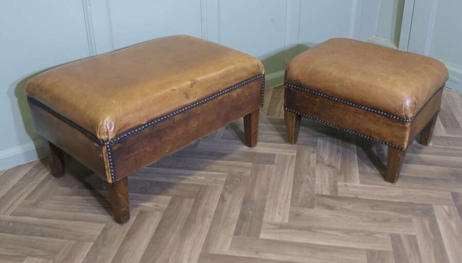 A Set Of Two Sturdy Leather Library Foot Stools photo furniture