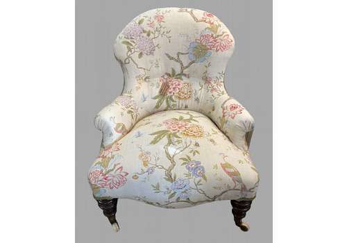 An Iron Framed Re Upholstered Nursing Chair