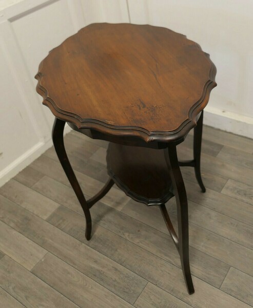 Oval Shaped Walnut Occasional Table photo Furniture