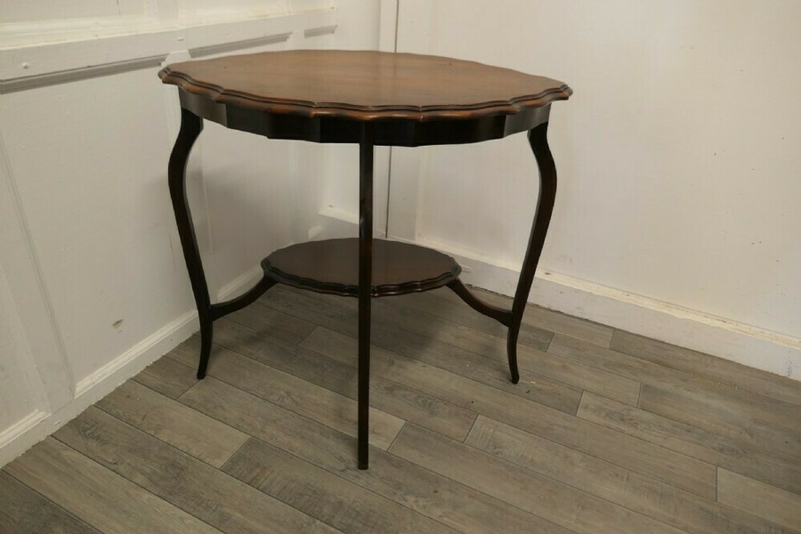 Oval Shaped Walnut Occasional Table photo 474.0